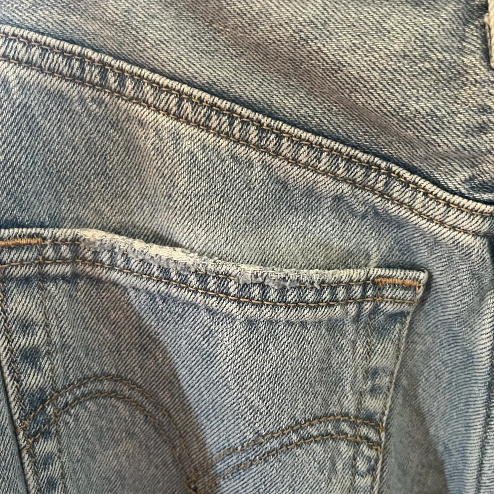 Levi's Premium High Rise Loose Tapered Distressed Denim Jeans